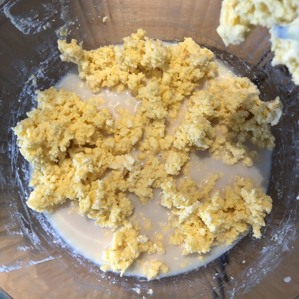Butter sitting in the separated buttermilk