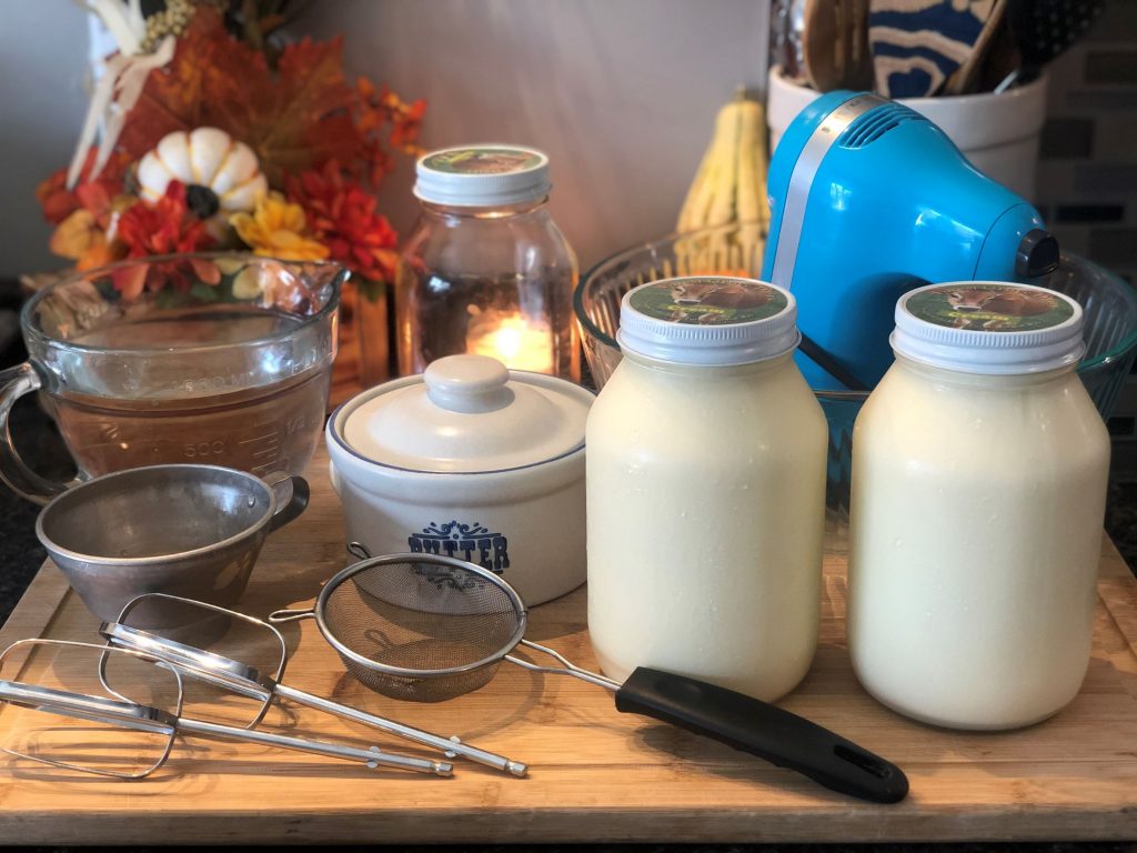 tools and ingredients for making homemade butter